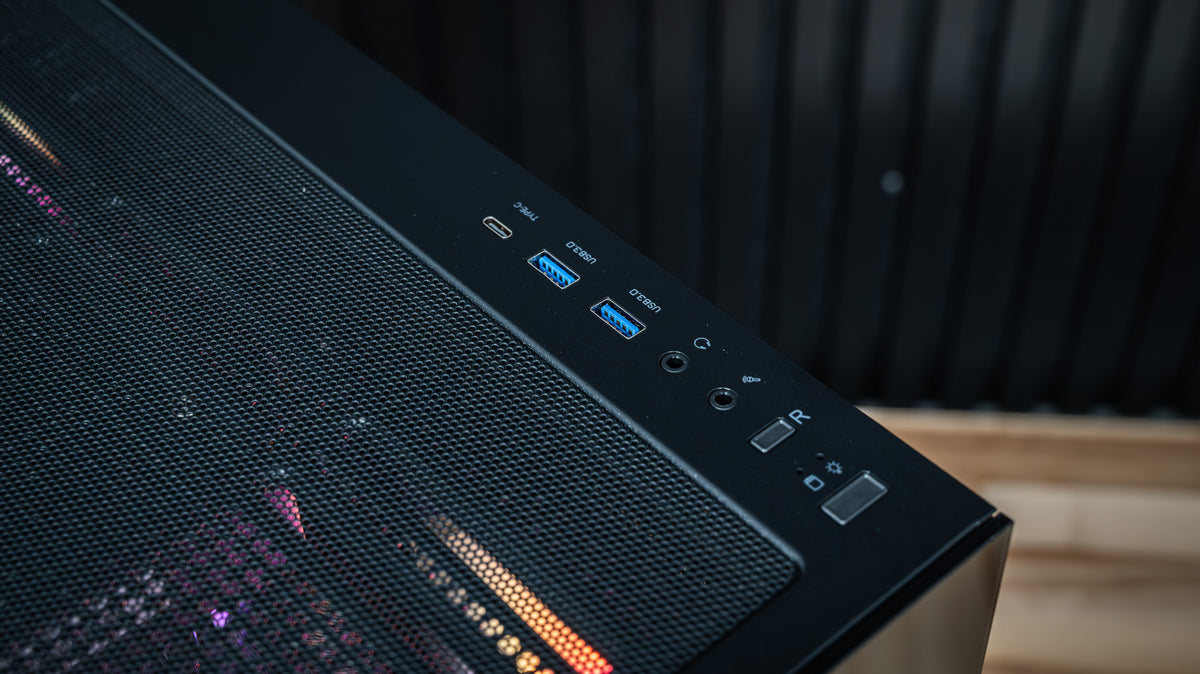 Night Hawk gaming PC top front I/O panel with USB-C, USB 3.0 ports, audio jacks and power button