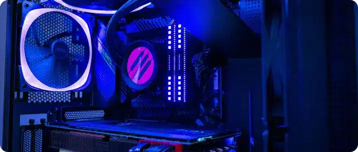 close up image of the internals of a custom pc with blue lighting and the powergpu logo on the cooler